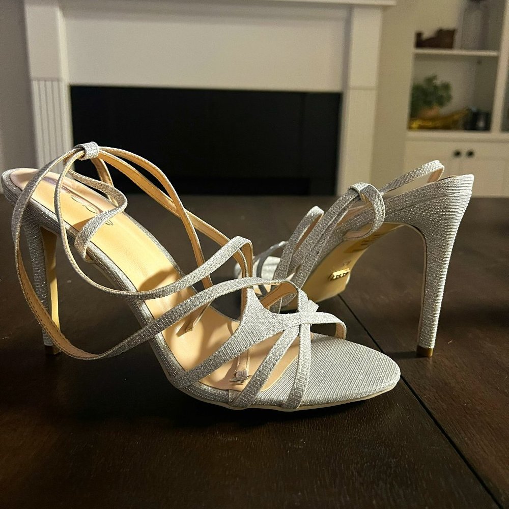 New BEBE Silver Stilettos